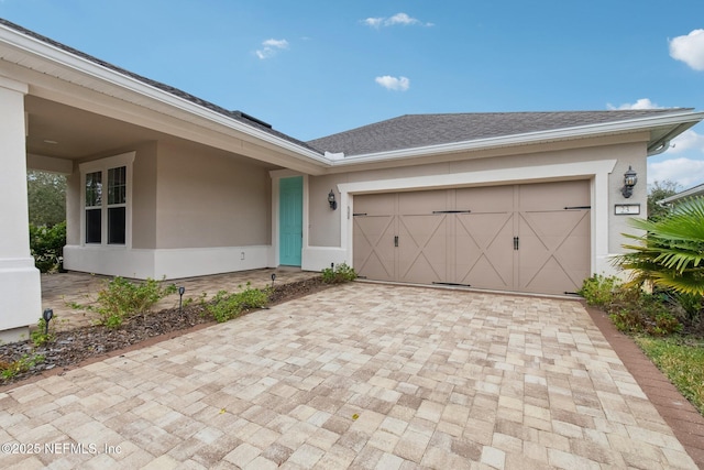 view of front of home with a garage