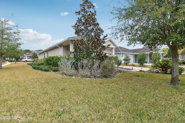 view of home's exterior featuring a lawn