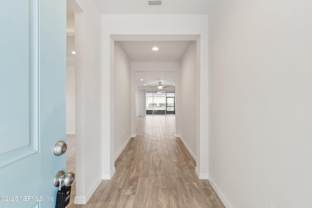 hall featuring light hardwood / wood-style floors