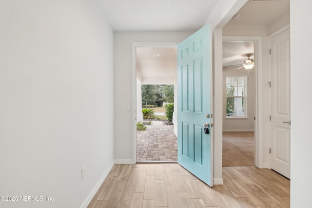 entryway with light hardwood / wood-style flooring