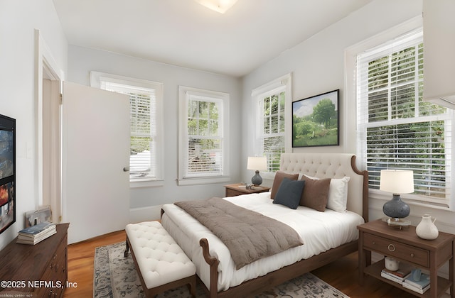 bedroom featuring hardwood / wood-style flooring