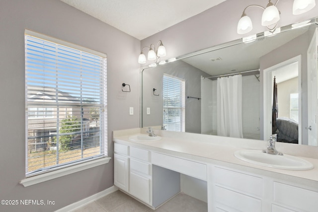 bathroom with vanity, tile patterned floors, and a shower with shower curtain