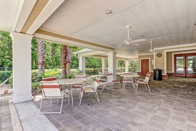 view of patio / terrace with french doors and ceiling fan