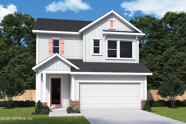 view of front of home featuring a garage and a front yard