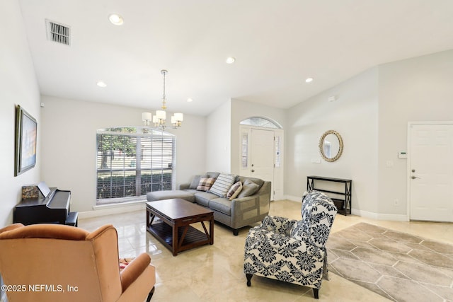 living room with lofted ceiling, recessed lighting, a notable chandelier, visible vents, and baseboards