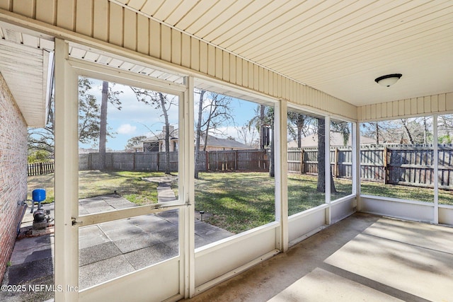 unfurnished sunroom with plenty of natural light