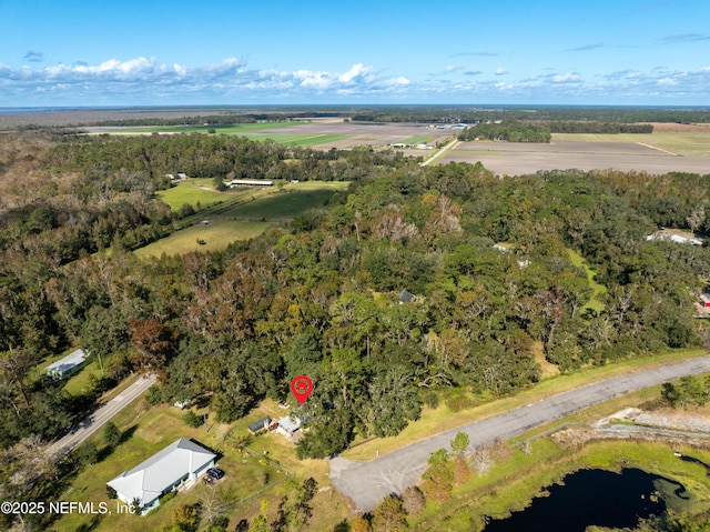 birds eye view of property featuring a rural view