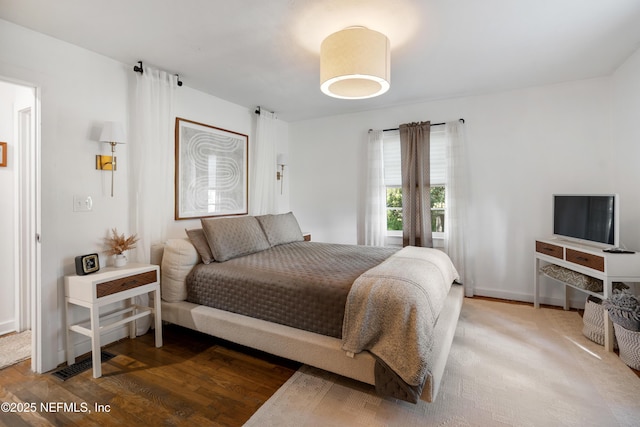 bedroom featuring hardwood / wood-style floors