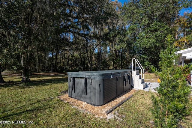 exterior space with a hot tub