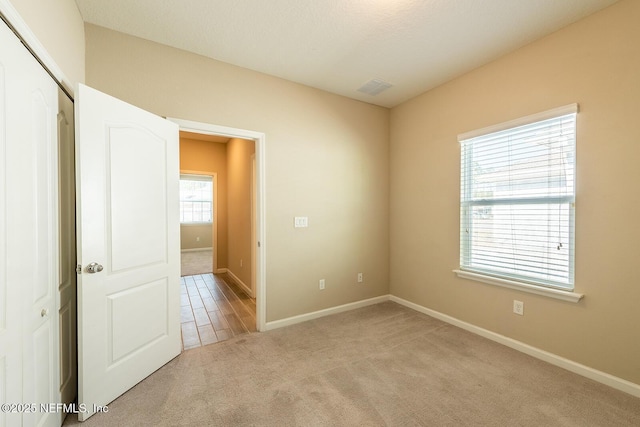 view of carpeted spare room