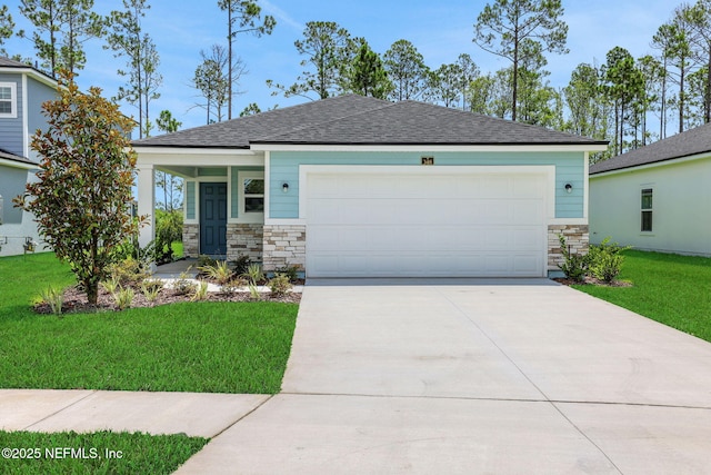 348 Salazar St, Saint Augustine, FL 32095 - view of front of house featuring stone siding, a front lawn, concrete driveway, a garage, and roof with shingles