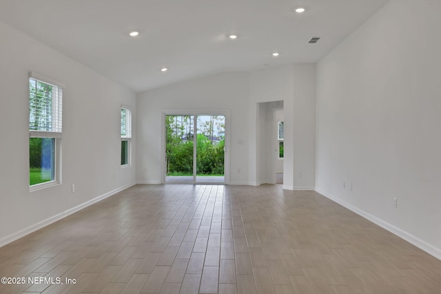 348 Salazar St, Saint Augustine, FL 32095 - spare room featuring plenty of natural light, lofted ceiling, recessed lighting, and light wood finished floors