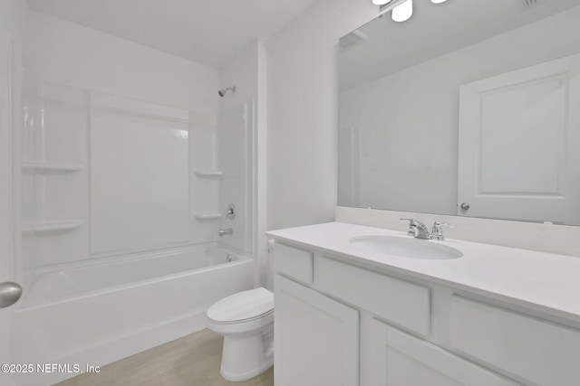 348 Salazar St, Saint Augustine, FL 32095 - full bath with vanity, bathtub / shower combination, and wood finished floors