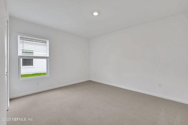 348 Salazar St, Saint Augustine, FL 32095 - carpeted empty room with baseboards and recessed lighting