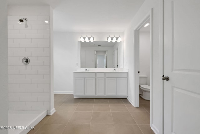 348 Salazar St, Saint Augustine, FL 32095 - bathroom featuring tile patterned floors, double vanity, and a tile shower