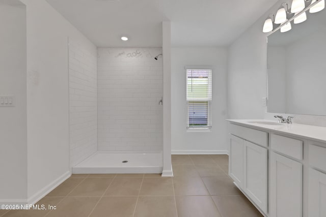 348 Salazar St, Saint Augustine, FL 32095 - bathroom with tile patterned flooring, vanity, and tiled shower