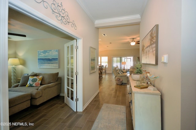 hall with ornamental molding and french doors