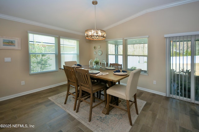 dining room featuring ornamental molding, lofted ceiling, dark hardwood / wood-style floors, and a notable chandelier