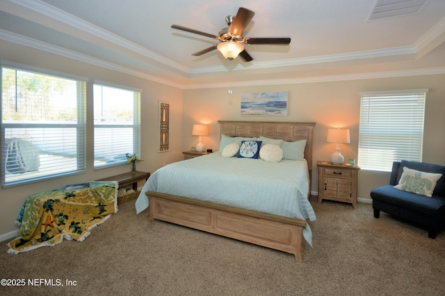 carpeted bedroom featuring ceiling fan and ornamental molding