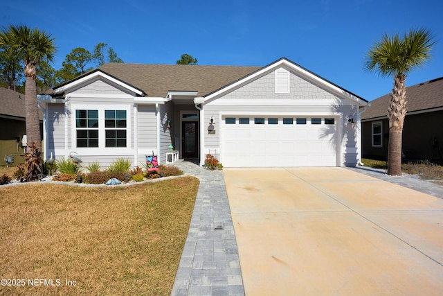 single story home with a garage and a front yard