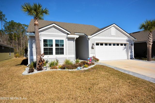 single story home featuring a garage and a front lawn