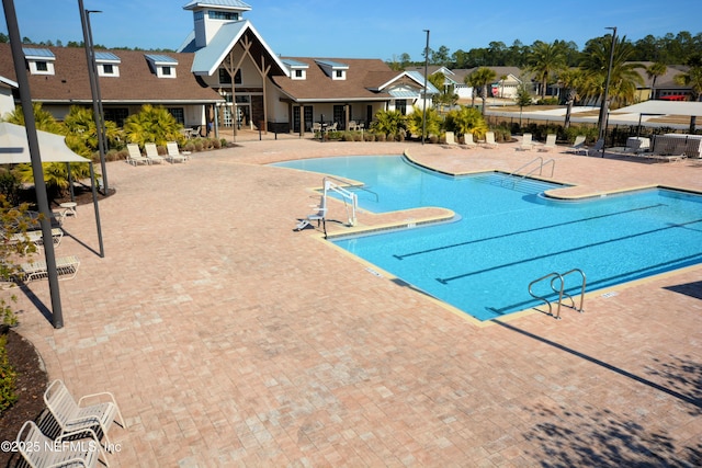 view of swimming pool featuring a patio