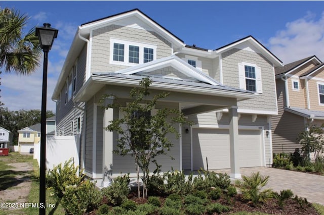 view of front of home with a garage