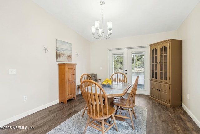 dining room featuring baseboards, dark wood finished floors, and french doors