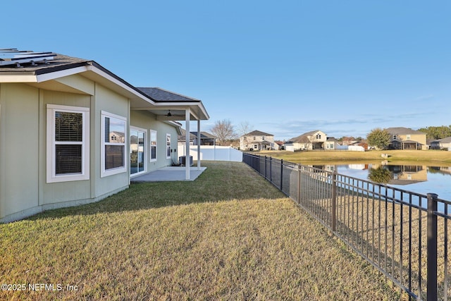 4468 Song Sparrow Dr, Middleburg, FL 32068 - view of yard featuring a patio, central air condition unit, and a water view