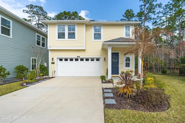 view of front of property with a garage