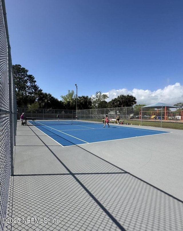 11 Bonita Dr, Ponte Vedra Beach, FL 32082 - view of tennis court with fence and community basketball court