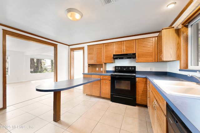 kitchen with light tile patterned floors, dark countertops, a sink, under cabinet range hood, and black appliances