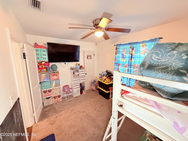 bedroom featuring carpet and ceiling fan