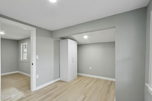 basement with light wood-type flooring