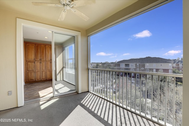 balcony featuring ceiling fan