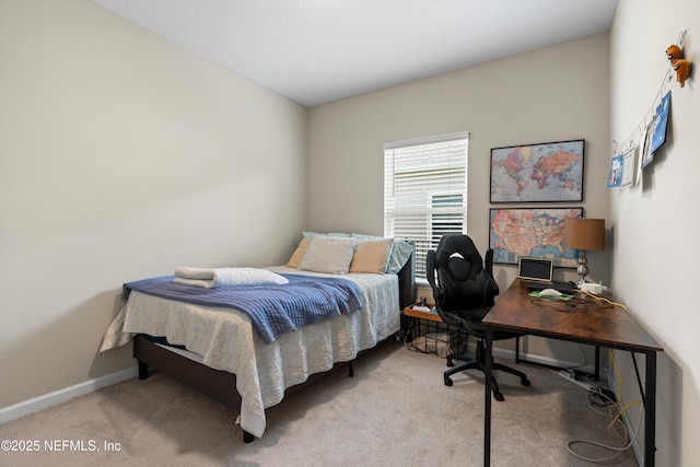 bedroom featuring light colored carpet