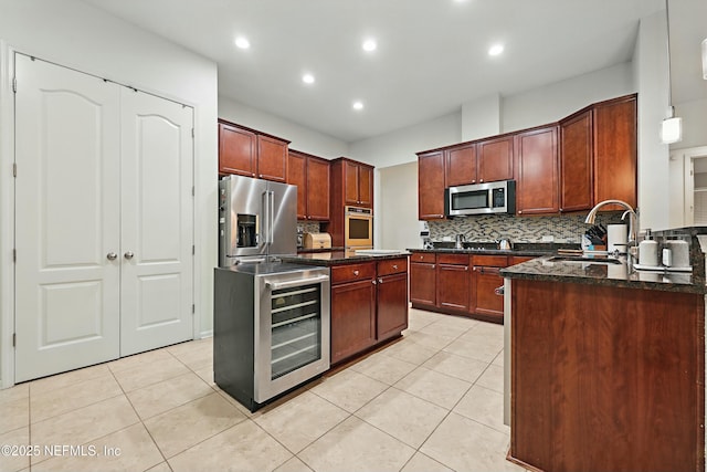 kitchen featuring backsplash, beverage cooler, light tile patterned floors, stainless steel appliances, and a sink