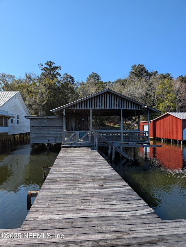 view of dock with a water view