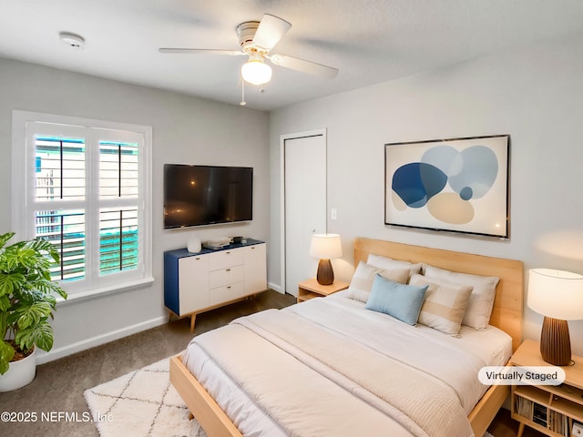 bedroom featuring ceiling fan and carpet floors