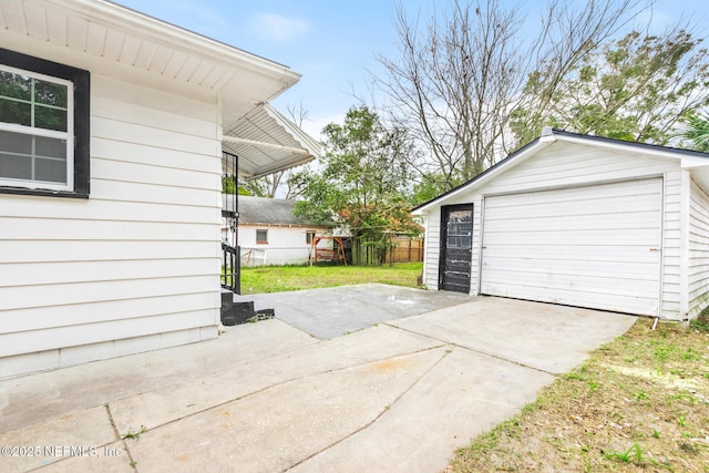 garage with a yard