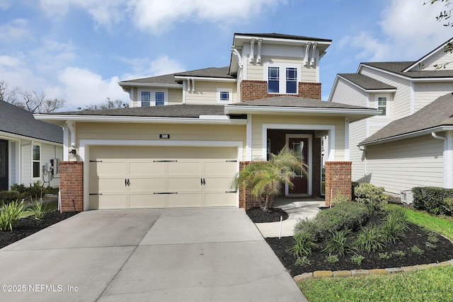 view of front of home with brick siding and driveway