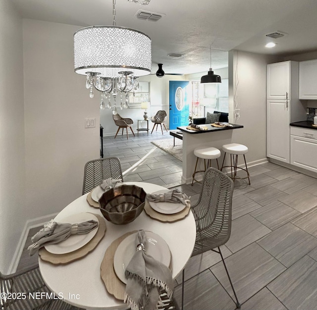 dining room with a chandelier