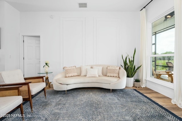 living room with wood-type flooring