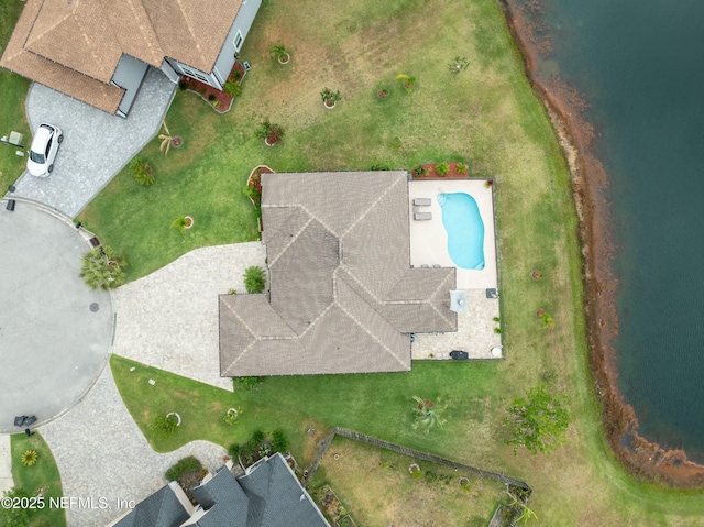 drone / aerial view with a water view