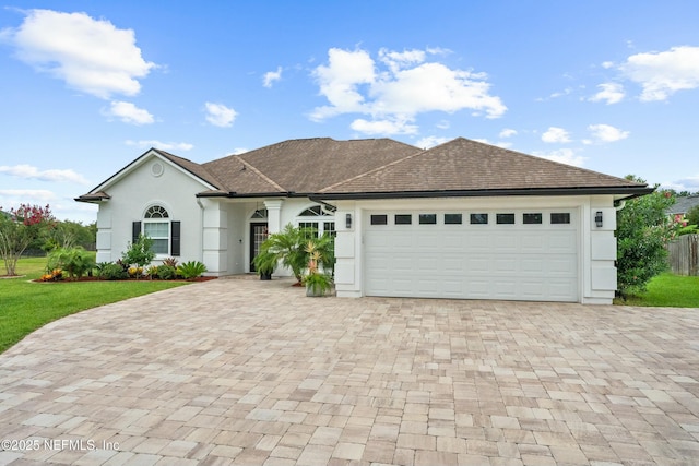 ranch-style home with a garage