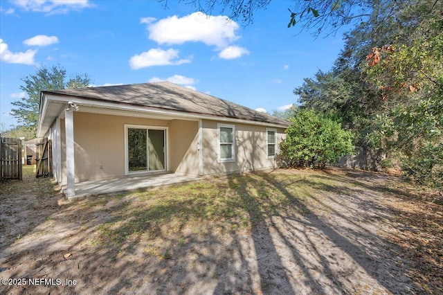 rear view of house with a patio