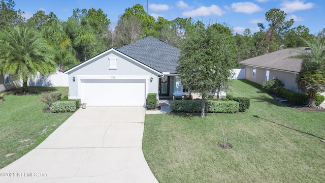 ranch-style house featuring roof with shingles, stucco siding, concrete driveway, an attached garage, and a front yard