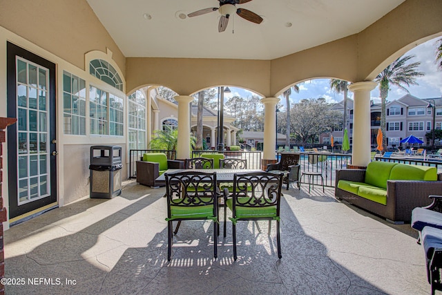 view of patio / terrace with an outdoor hangout area, ceiling fan, and a swimming pool