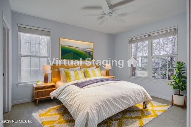 bedroom featuring ceiling fan and carpet floors