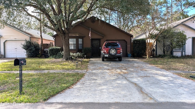 ranch-style home featuring a garage